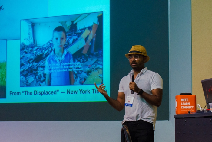 <strong>Immersive journalism.</strong> Deepak Chetty of the University of Texas presents the Immerj portal that helps journalists access virtual reality technology to tell compelling stories. Courtesy Jorge Salazar, TACC.