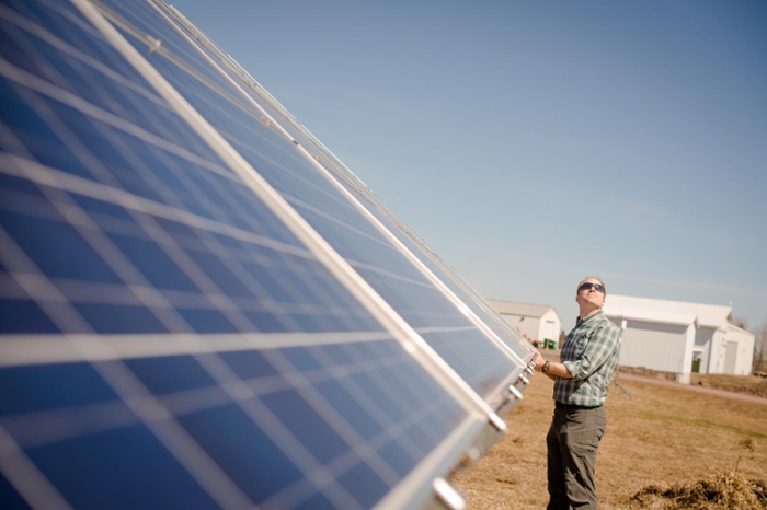 <strong>Deadly industries.</strong> Joshua Pearce argues that the coal and tobacco industries harm more people than they employ. He believes that tobacco farmers would benefit if they converted their land to solar farms. Courtesy Sarah Bird/Michigan Tech.