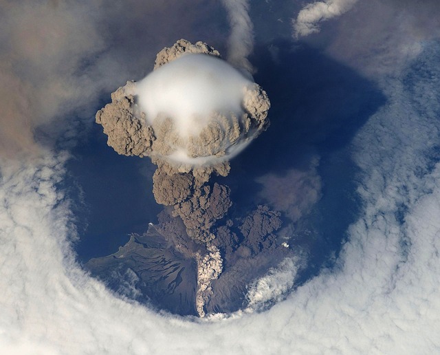 <strong>When a volcano erupts</strong>, sulfur compounds are introduced to the upper atmosphere. The tiny particles are highly reflective and send a percentage of sunlight back into space, causing the planet to cool.